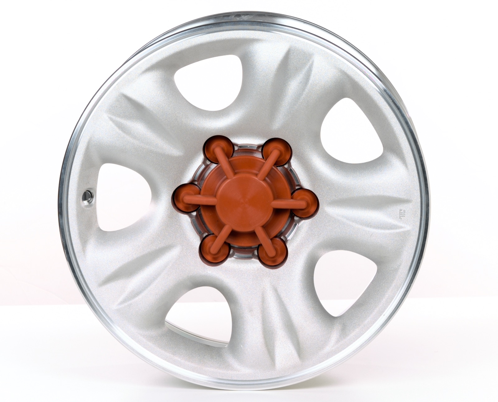 Custom molded mask installed on a wheel